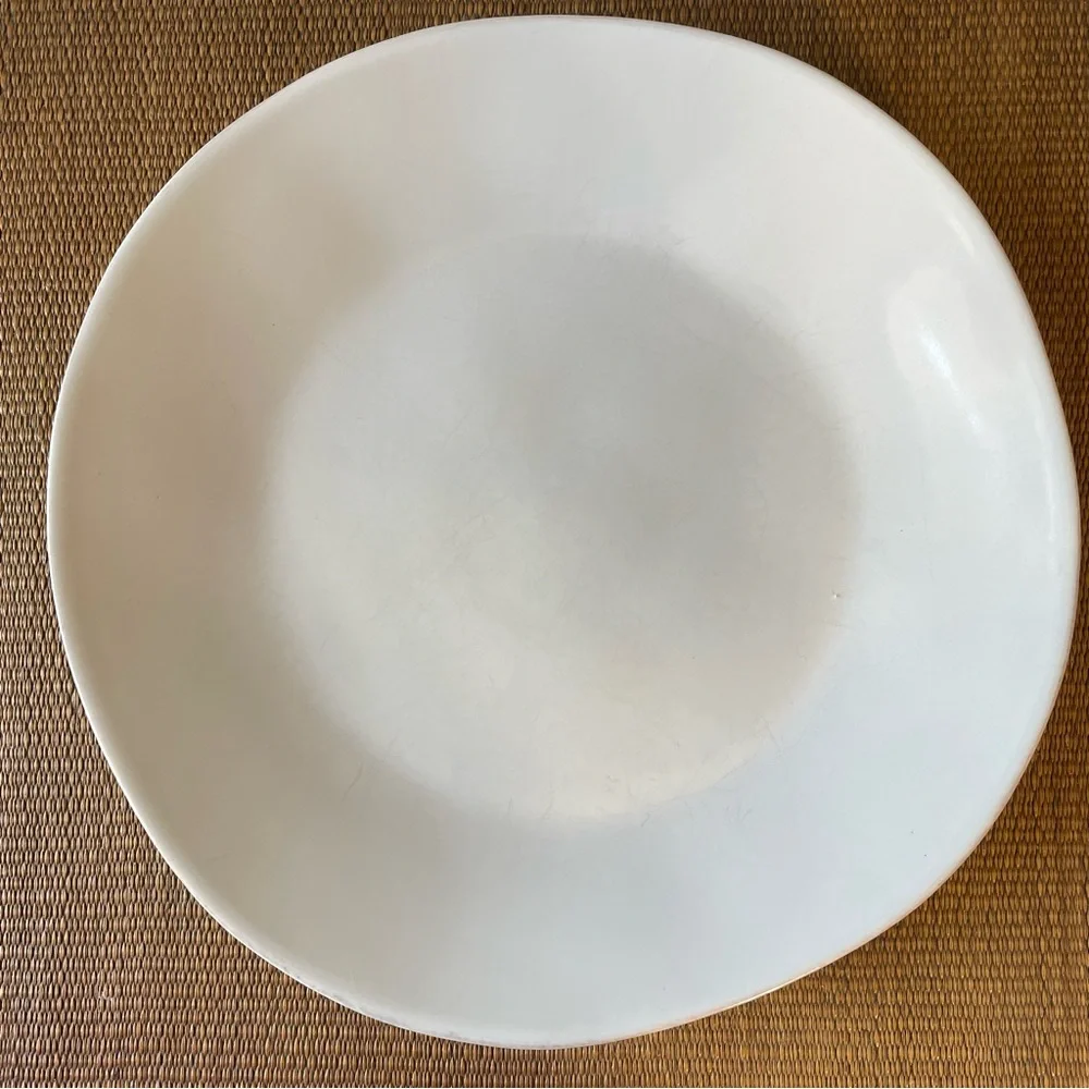 Crate & Barrel white organic wavy dinner plate